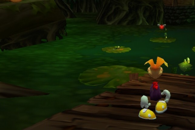 Limbless Frenchman Rayman stands on a dock in the marshes of awakening